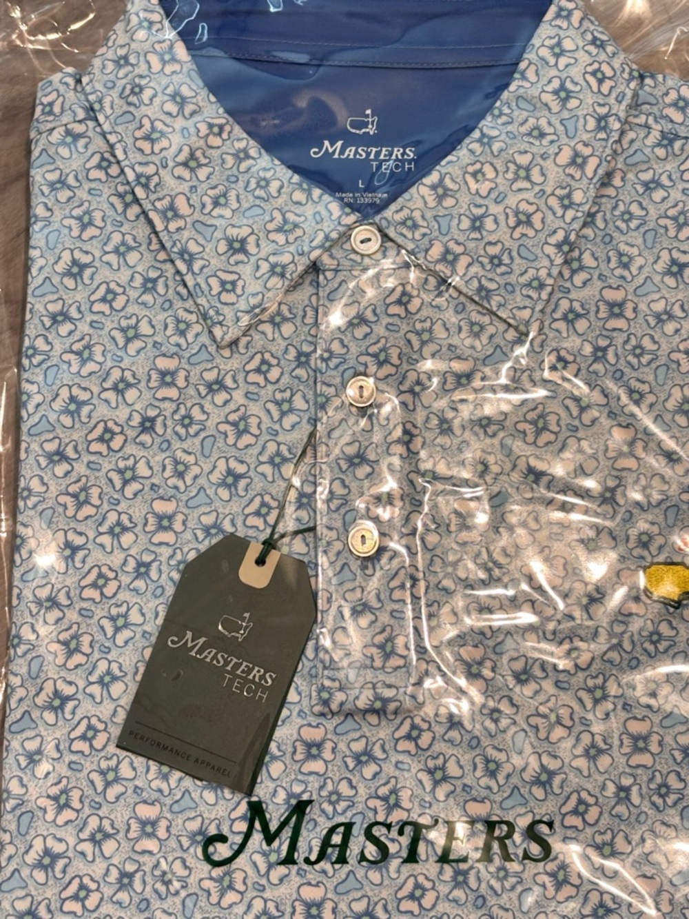 Masters 2026 - Dogwood pattern Tech Men's Light Blue  Golf Polo - New with Tags